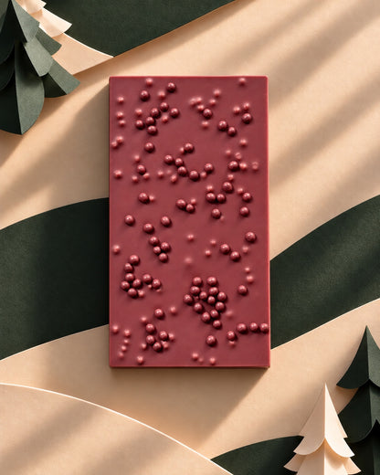 Verso da barra de chocolate rosa Advento com pequenas esferas